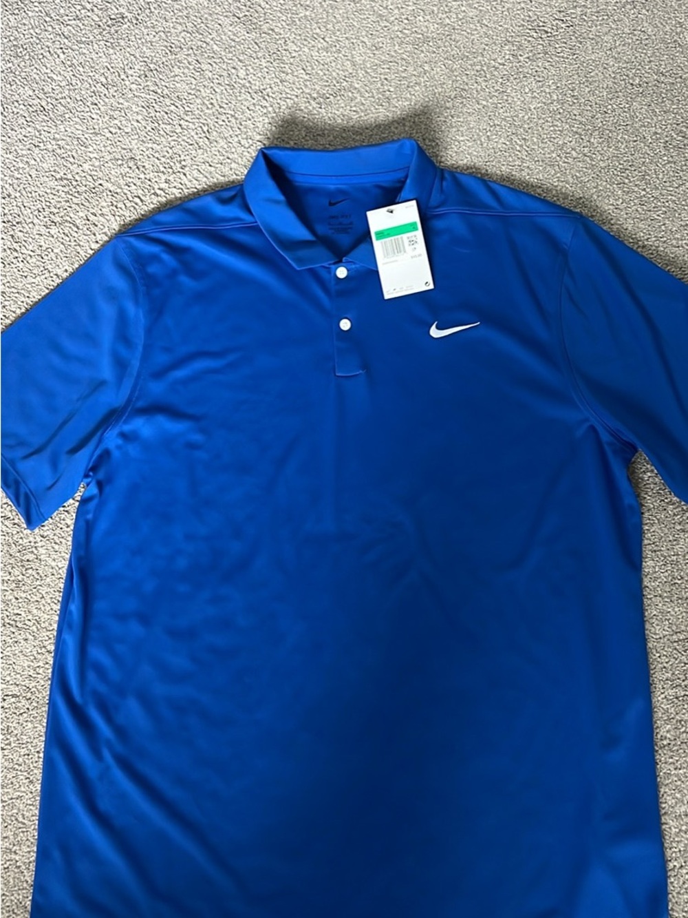 NWT Nike Men’s Royal Blue Polo Shirt with White Swoosh